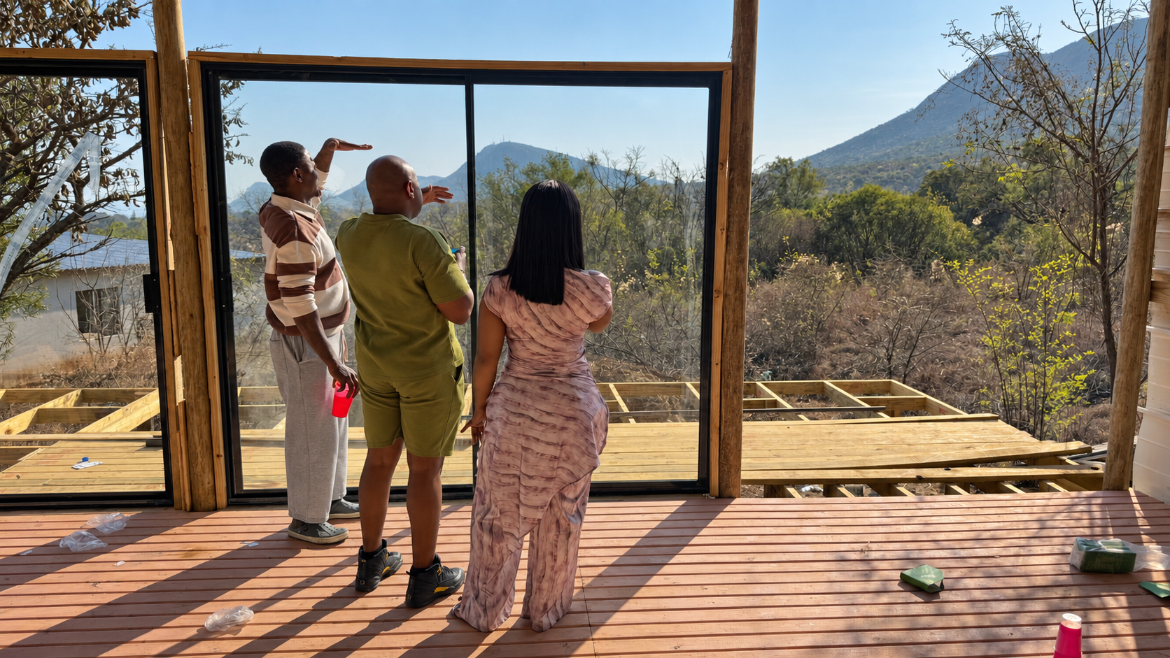 Sliding glass doors of the new unit framing the mountain and bush views at Sango Hartbeespoort