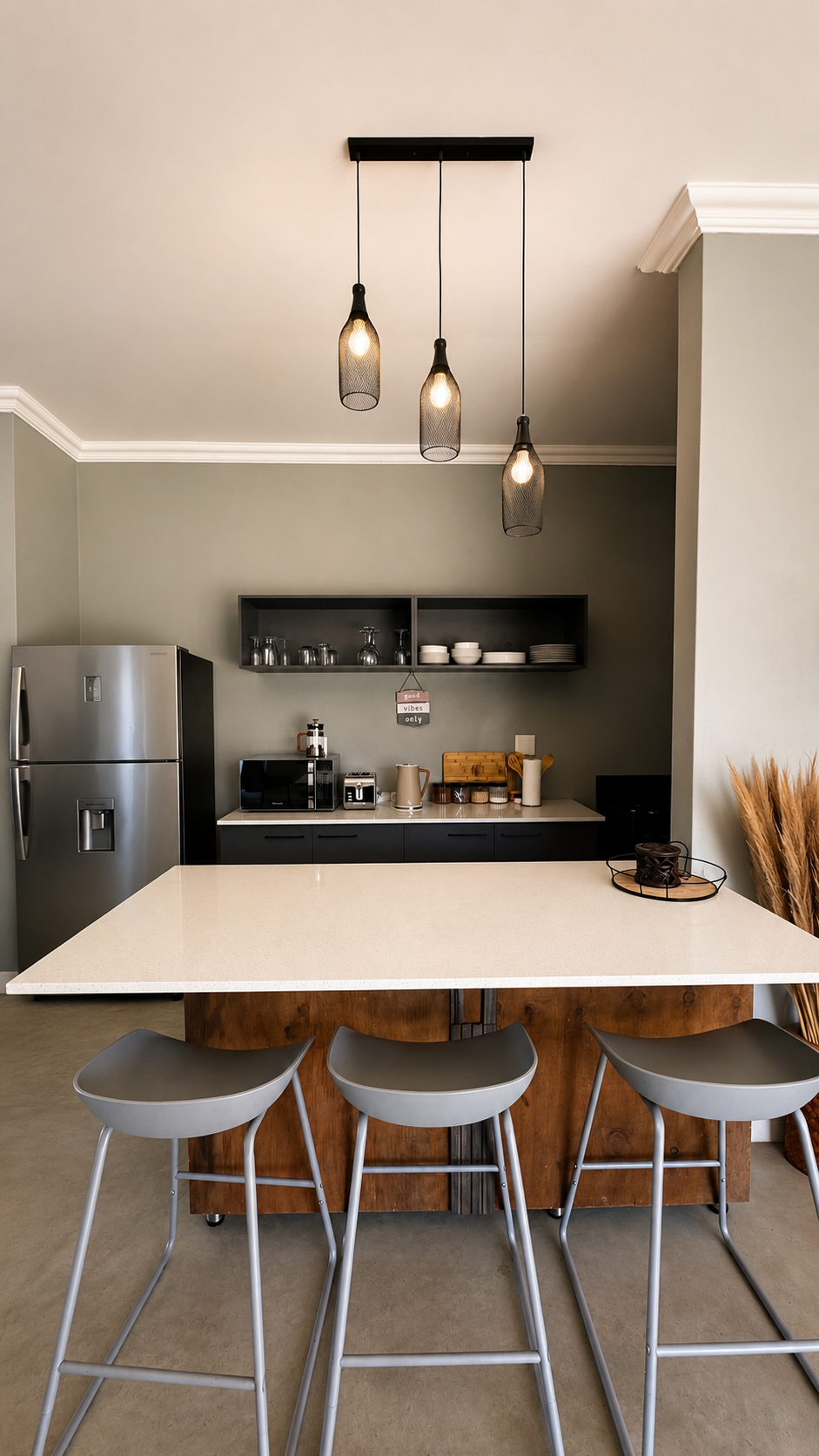 Kitchen island with pendant lights at Sango on 9 Euphoria